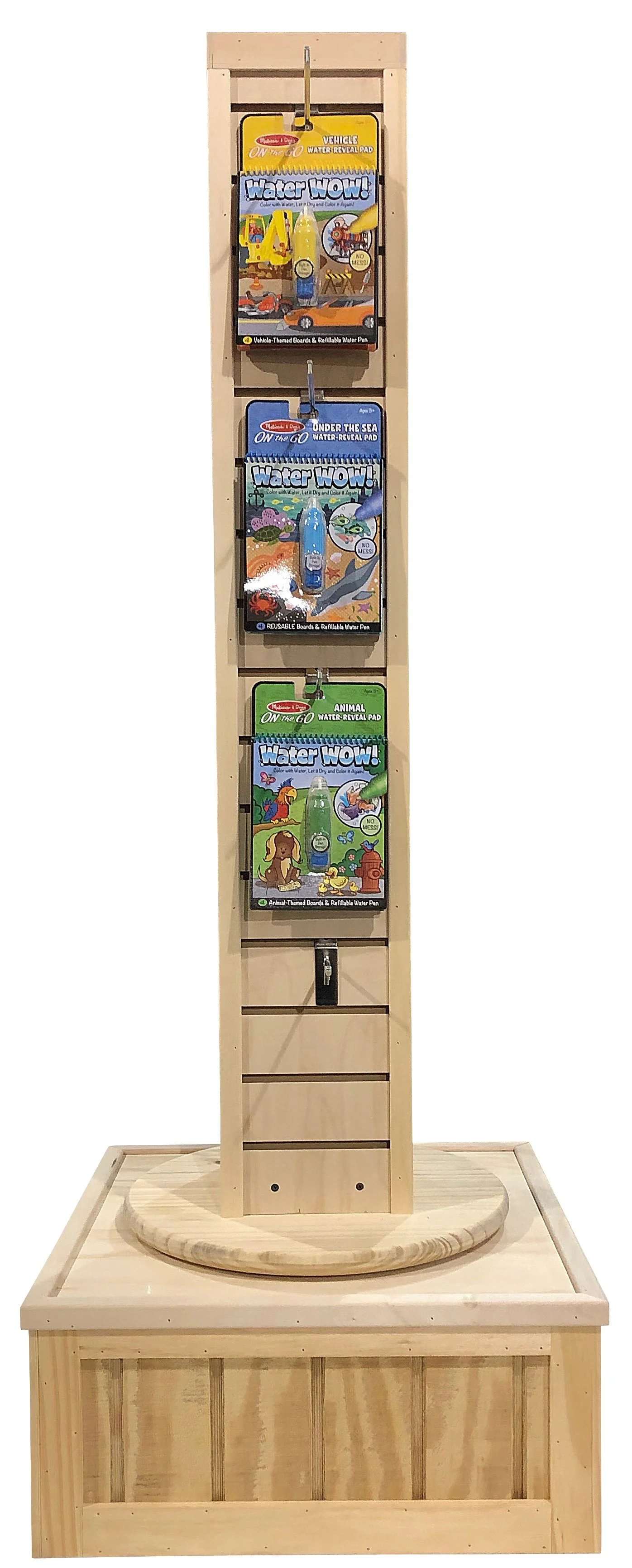 Rotating floor display with slatwall and peg hooks on a crate base