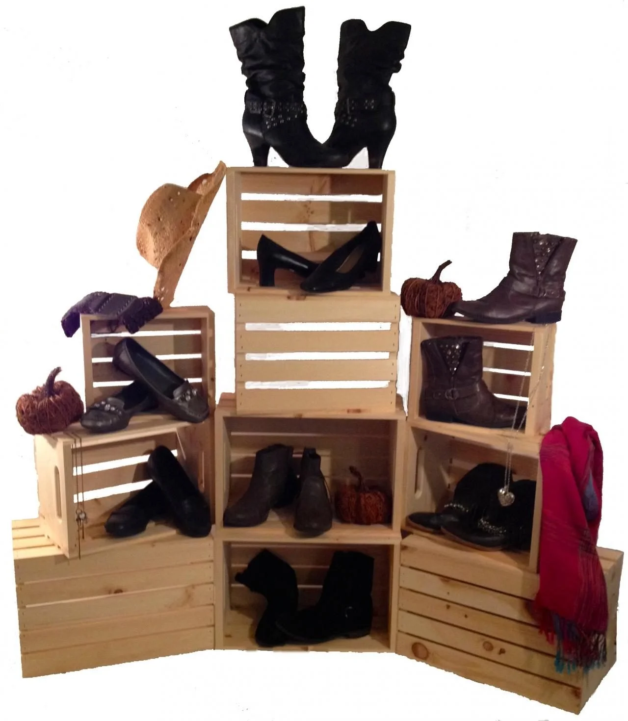 Stacked wood crates displaying boots and shoes