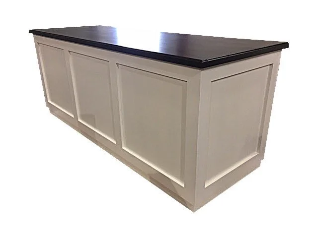 Shabby chic cream sales counter with raised panels
