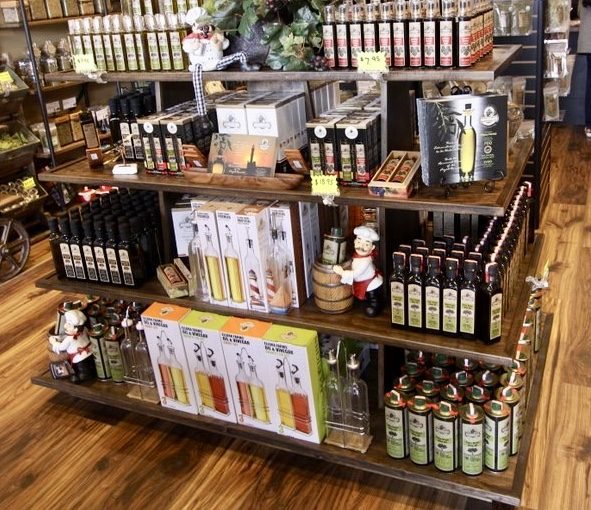 Island gondola with olive oil and specialty food shelves