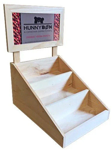 Three-tier pine counter display with removable color sign