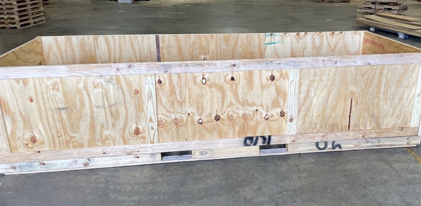 Custom wooden shipping crate for industrial equipment
