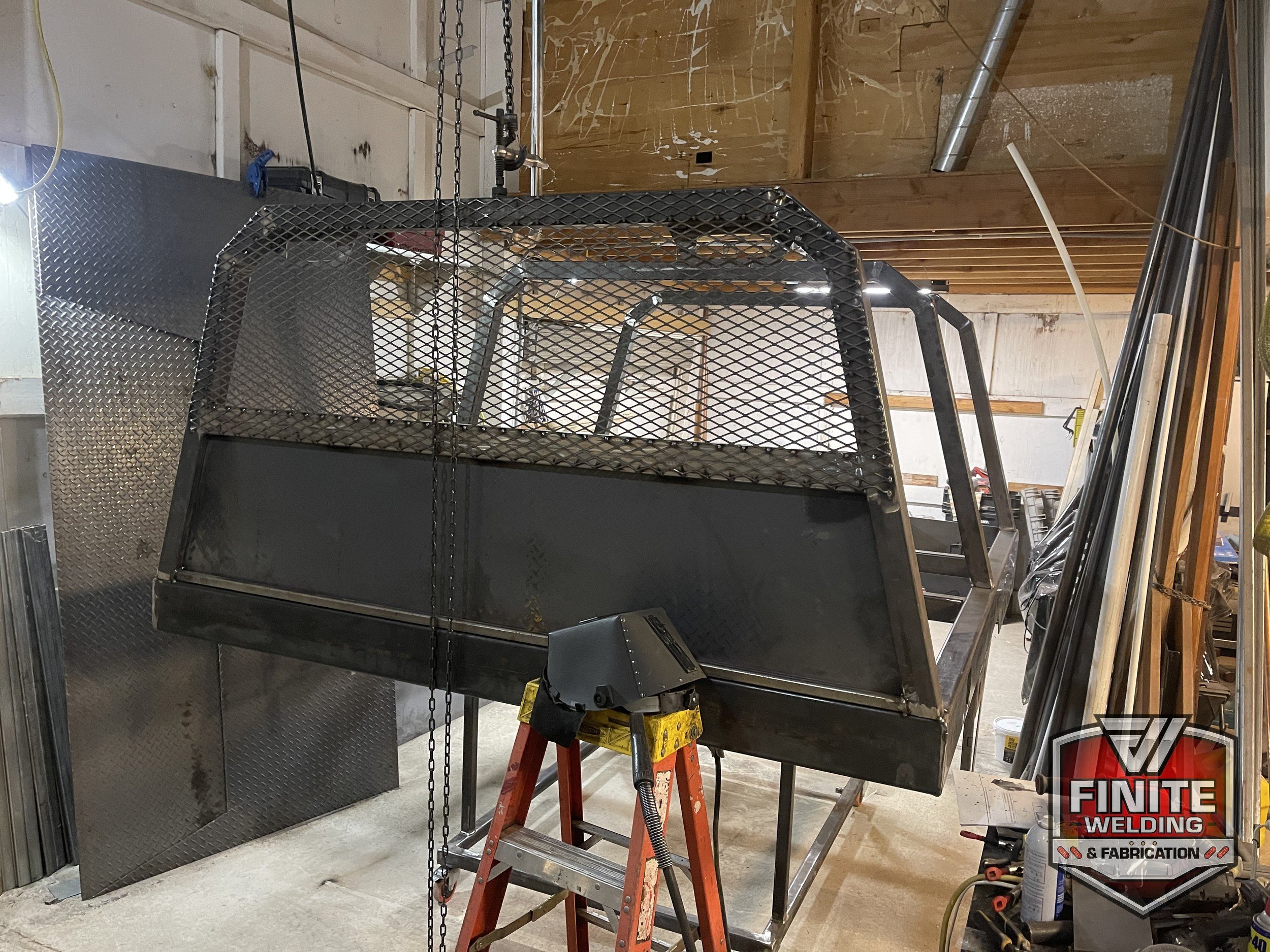 chevy-silverado-hd-welding-flatbed-05_in-progress-mesh-headache-rack.jpg