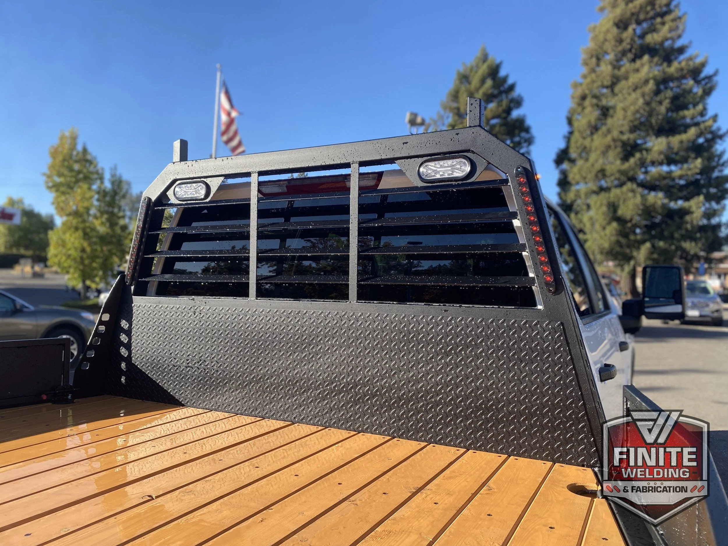 2026 Chevy Silverado 3500 dually deck and headache rack rear view