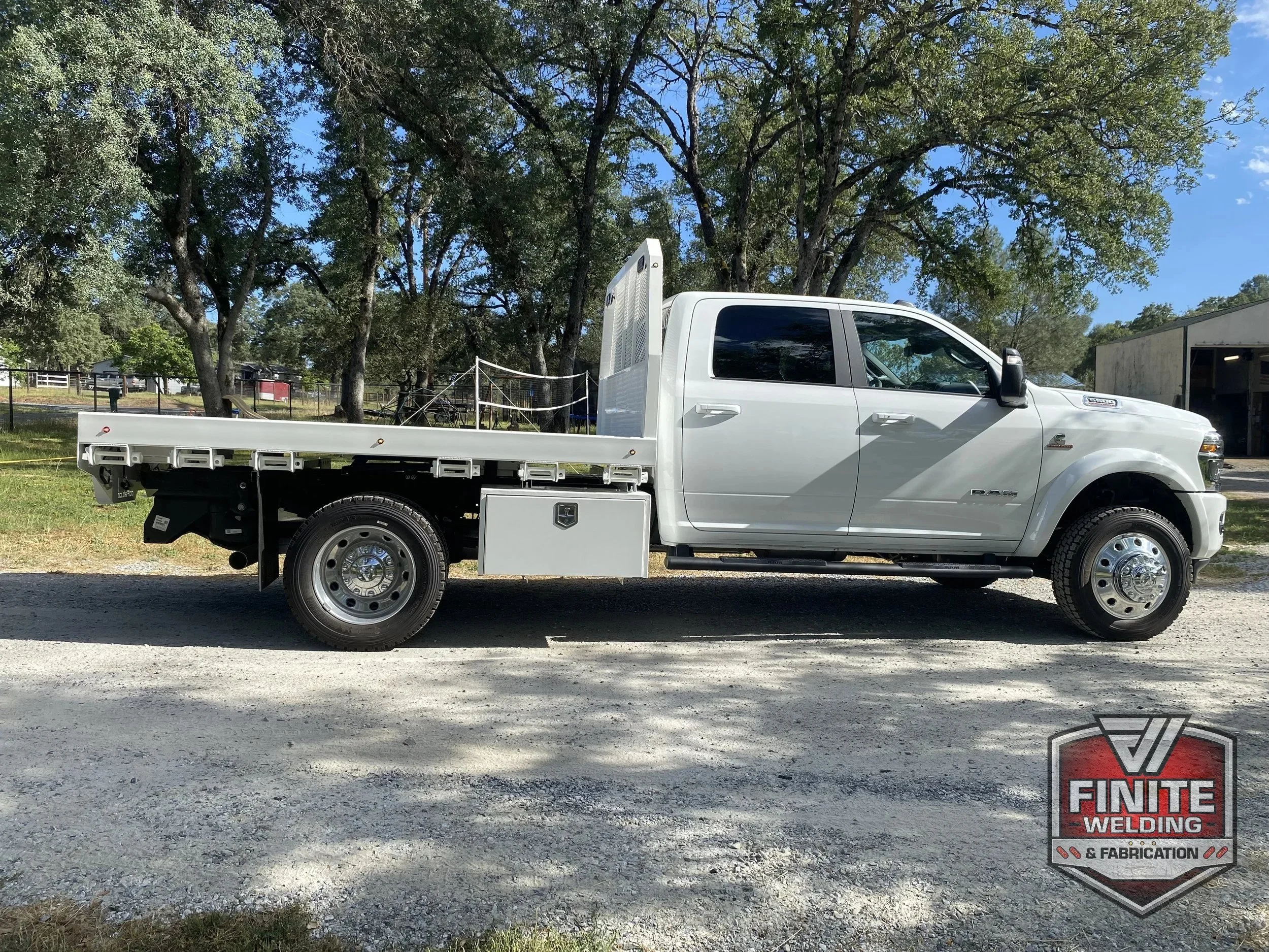 2023 Ram 5500 white dump flatbed, view 3