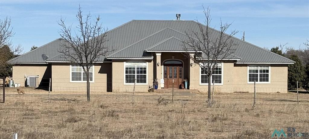 208 Cando Road, Texico, NM ---- $749,900 ---- this beautiful home is located 2.4 miles from the Texico High School on 10 acres.... 
