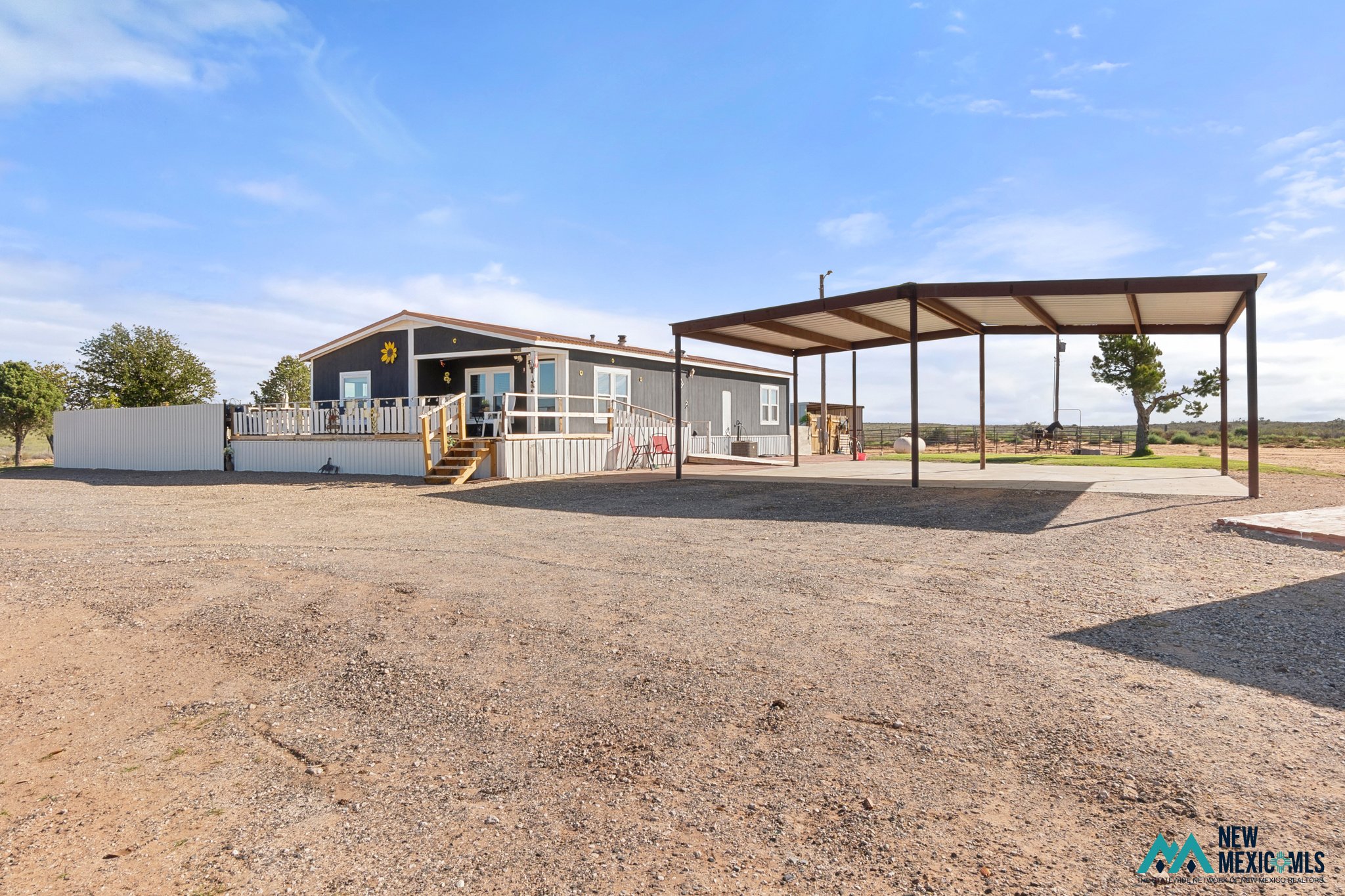 267 Sandhill Road, Portales ---- $260,000 ----Situated on 3 acres in the sandhills just two miles from Portales....