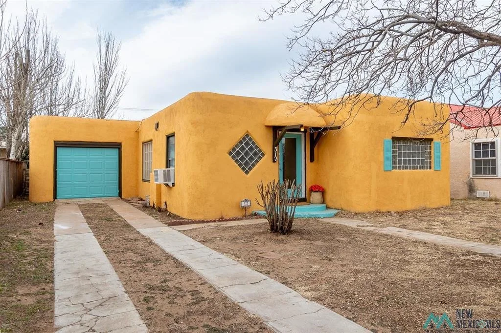 312 S Avenue J, Portales, NM - $99,000 - Charming Pueblo Southwest-style home just one block from the college....