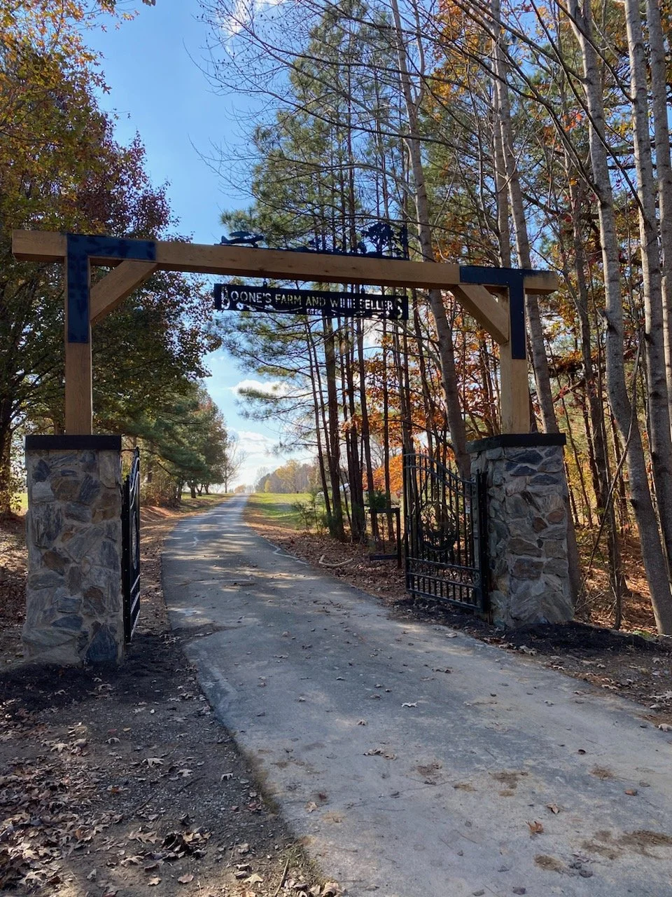 2024_Ron Boone_Hanging Ranch Sign.jpeg