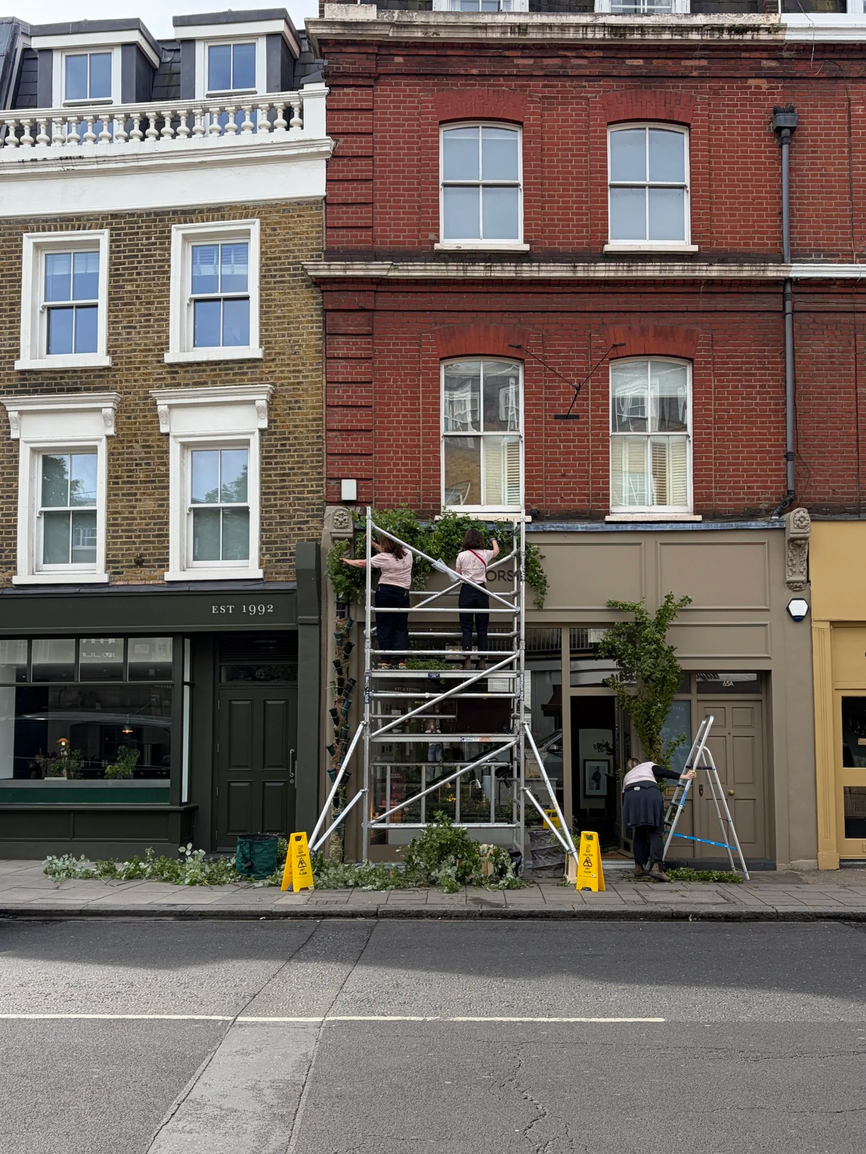 Florists creating flower display in London