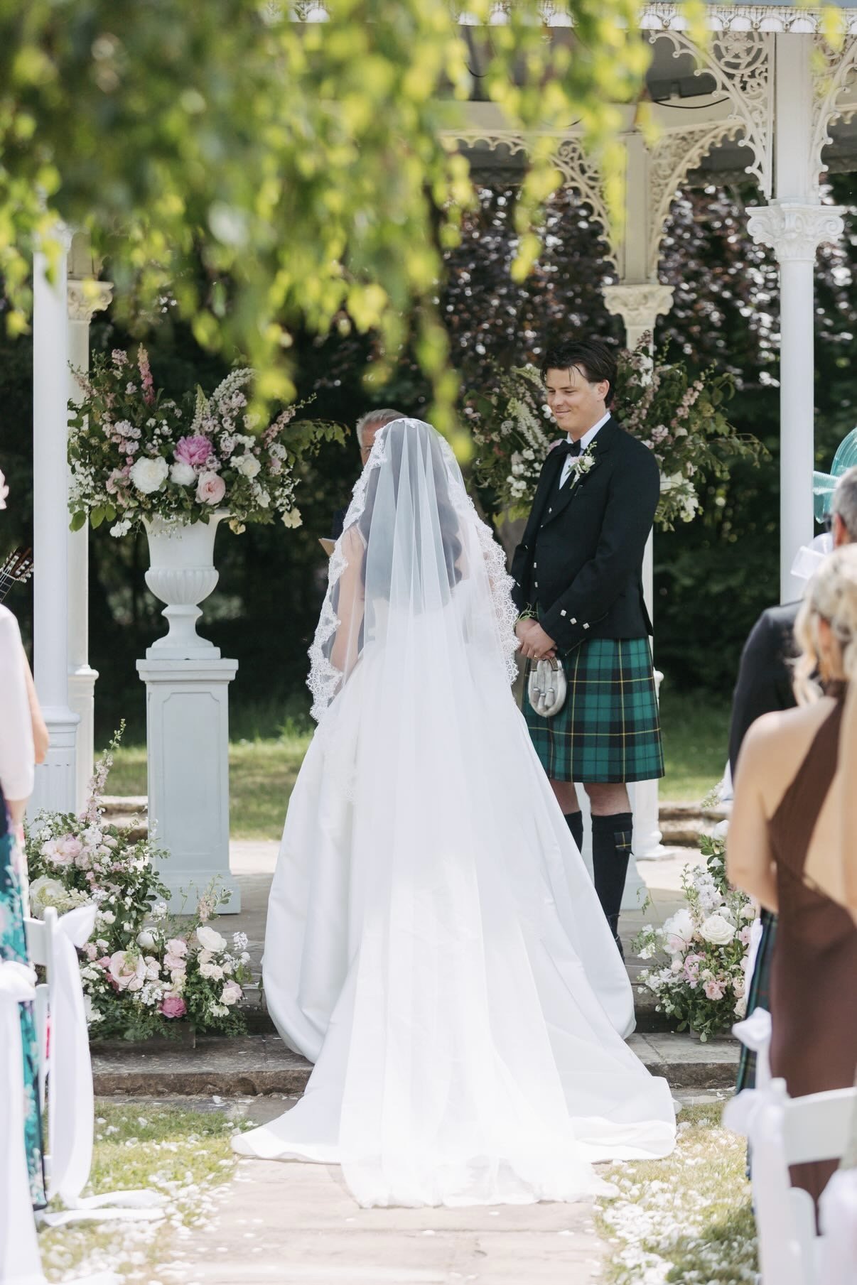 Ceremony flowers for a wedding at Thicket Priory, made by a luxury Yorkshire wedding florist