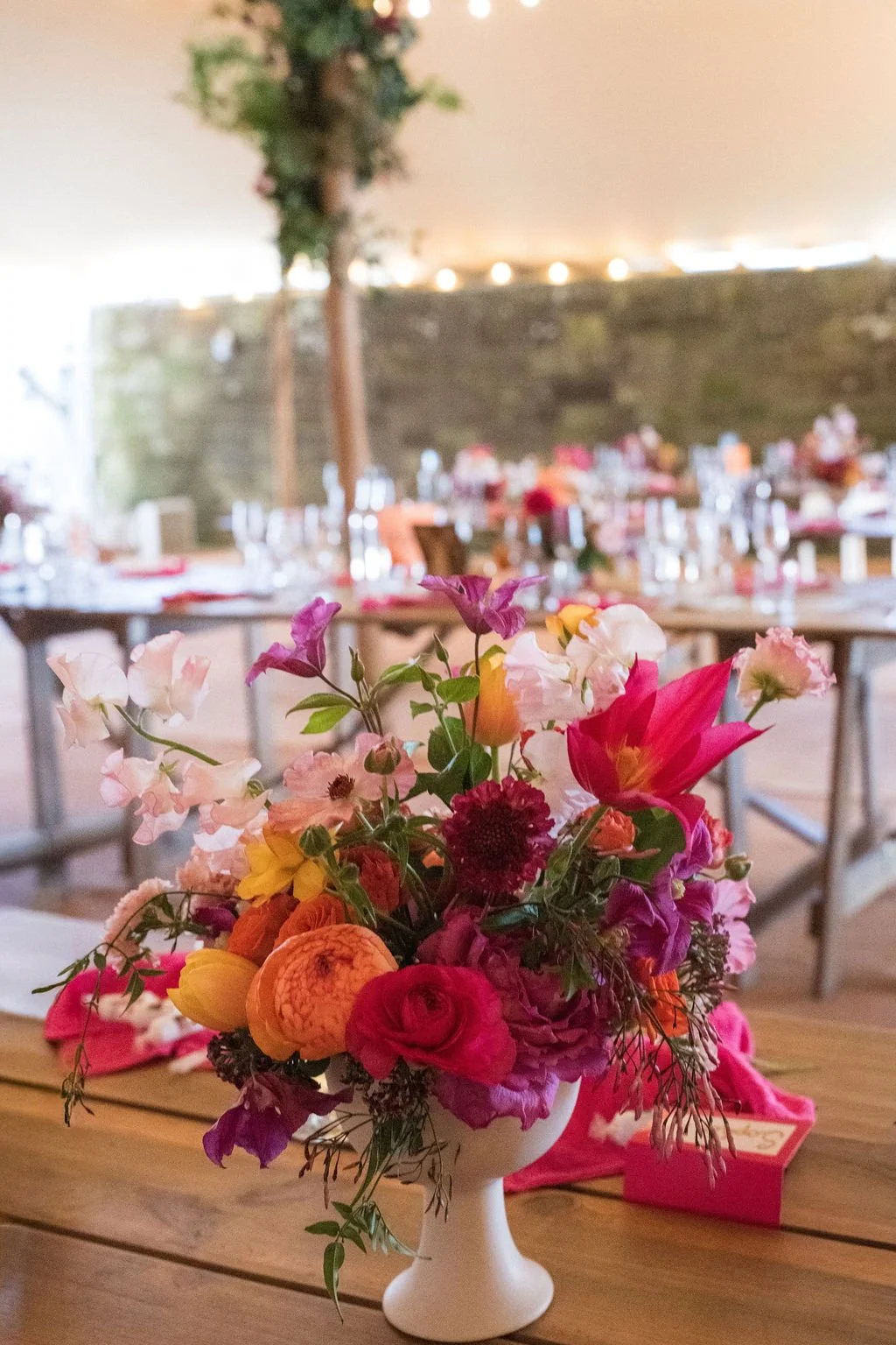 Bright, colourful and natural wedding reception table centre pieces