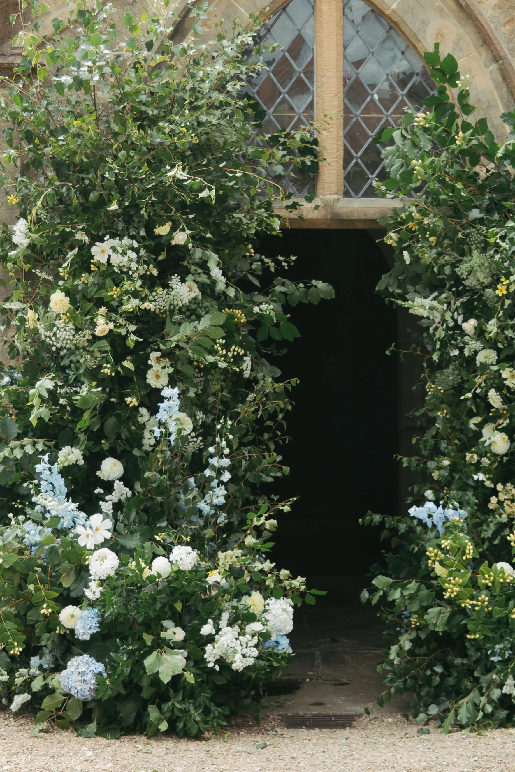 Broken archway flowers for church entrance in Yorkshire