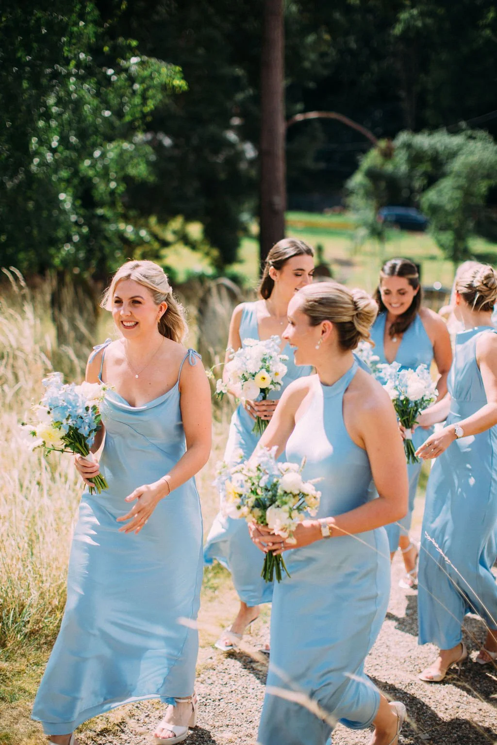white and blue and yellow bridal bouquets