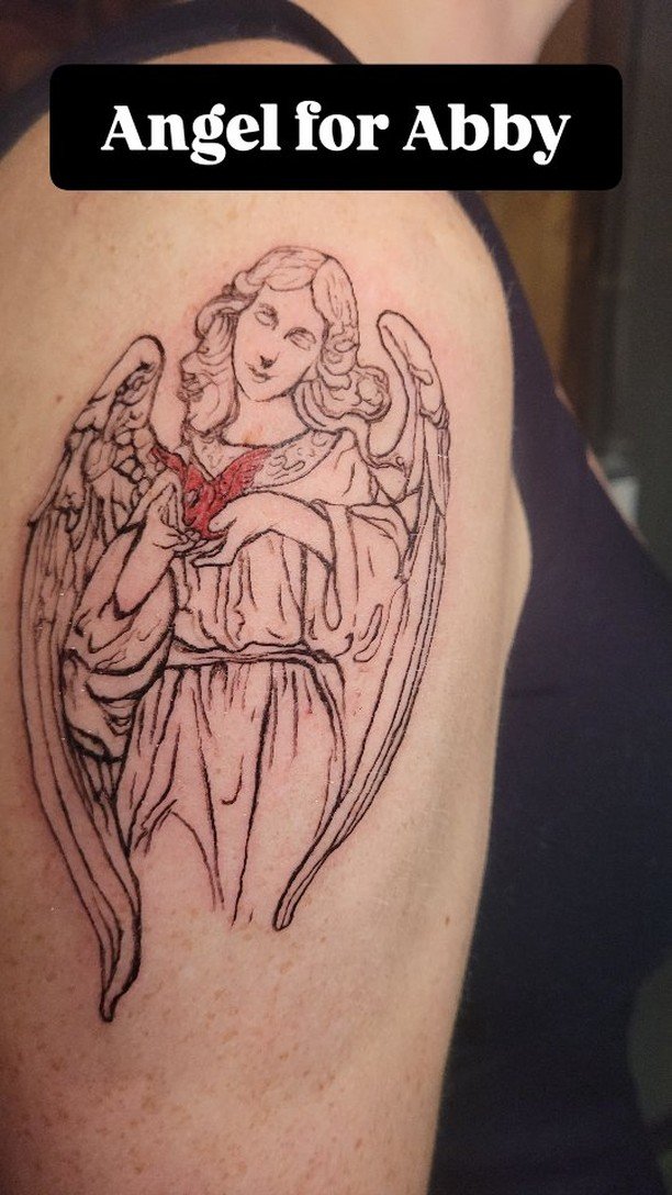 Angel with a cardinal for Abby in honor of her grandmother. #dentontattooartist #angeltattoo #dfwtattooartist #angel