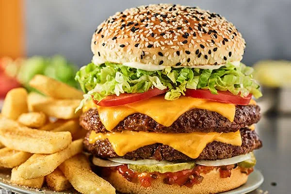 A plate of burger and fries from Red Robin.