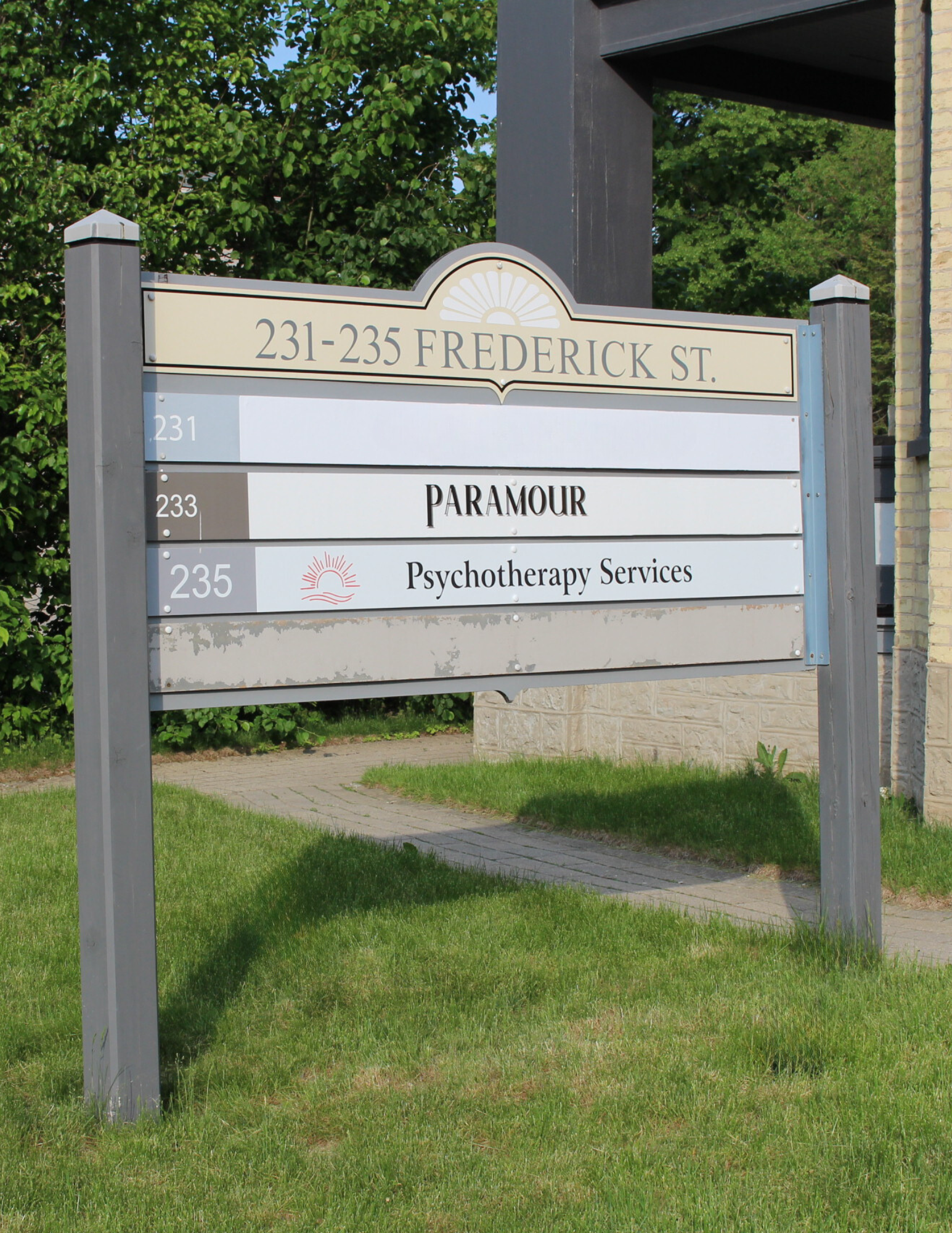 Sign out front of 235  Federick Street, Kitchener where Kaleigh Russell provides therapy in Kitchener-Waterloo