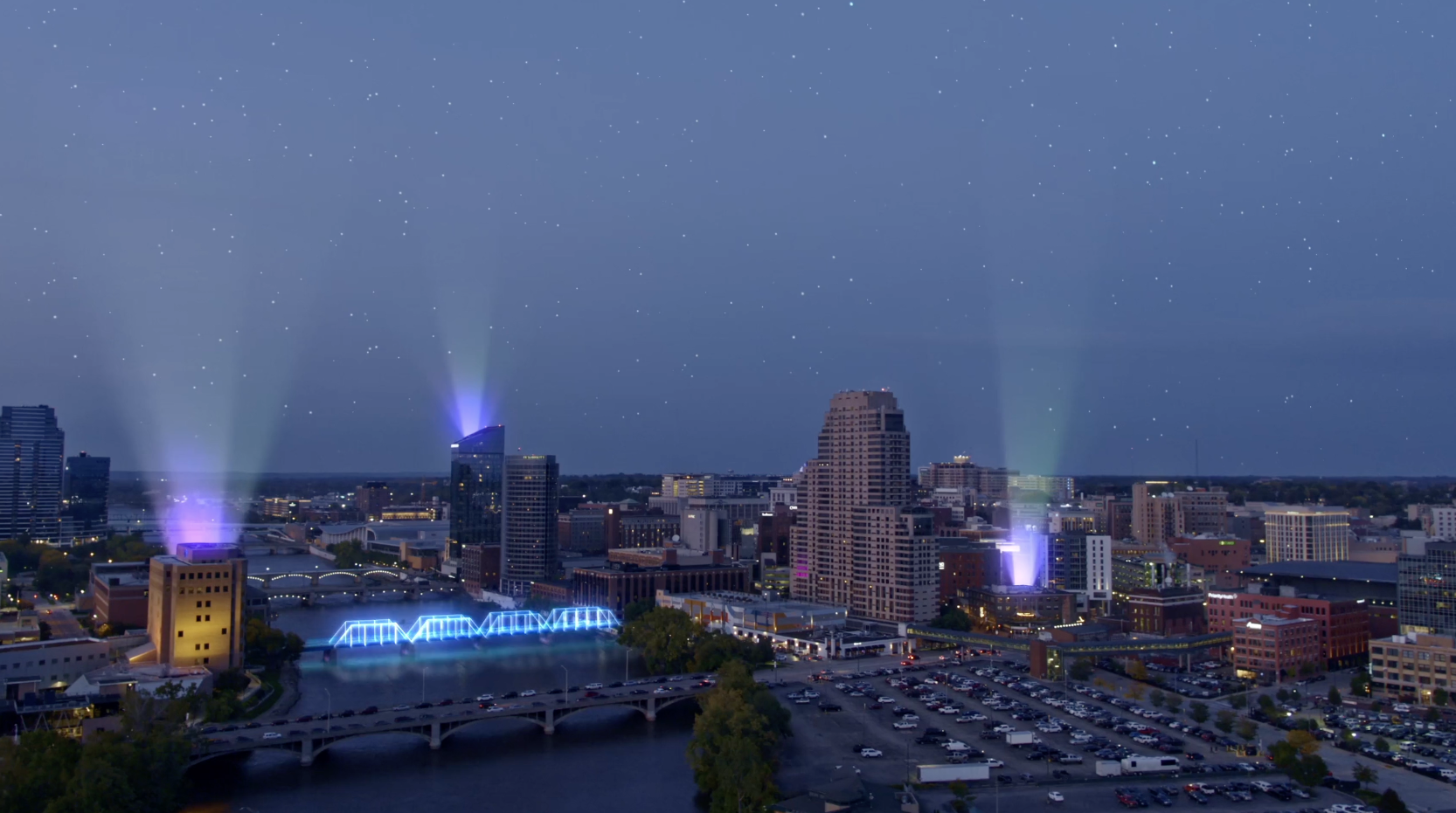 CGI animated aerial view of downtown Grand Rapids at night.