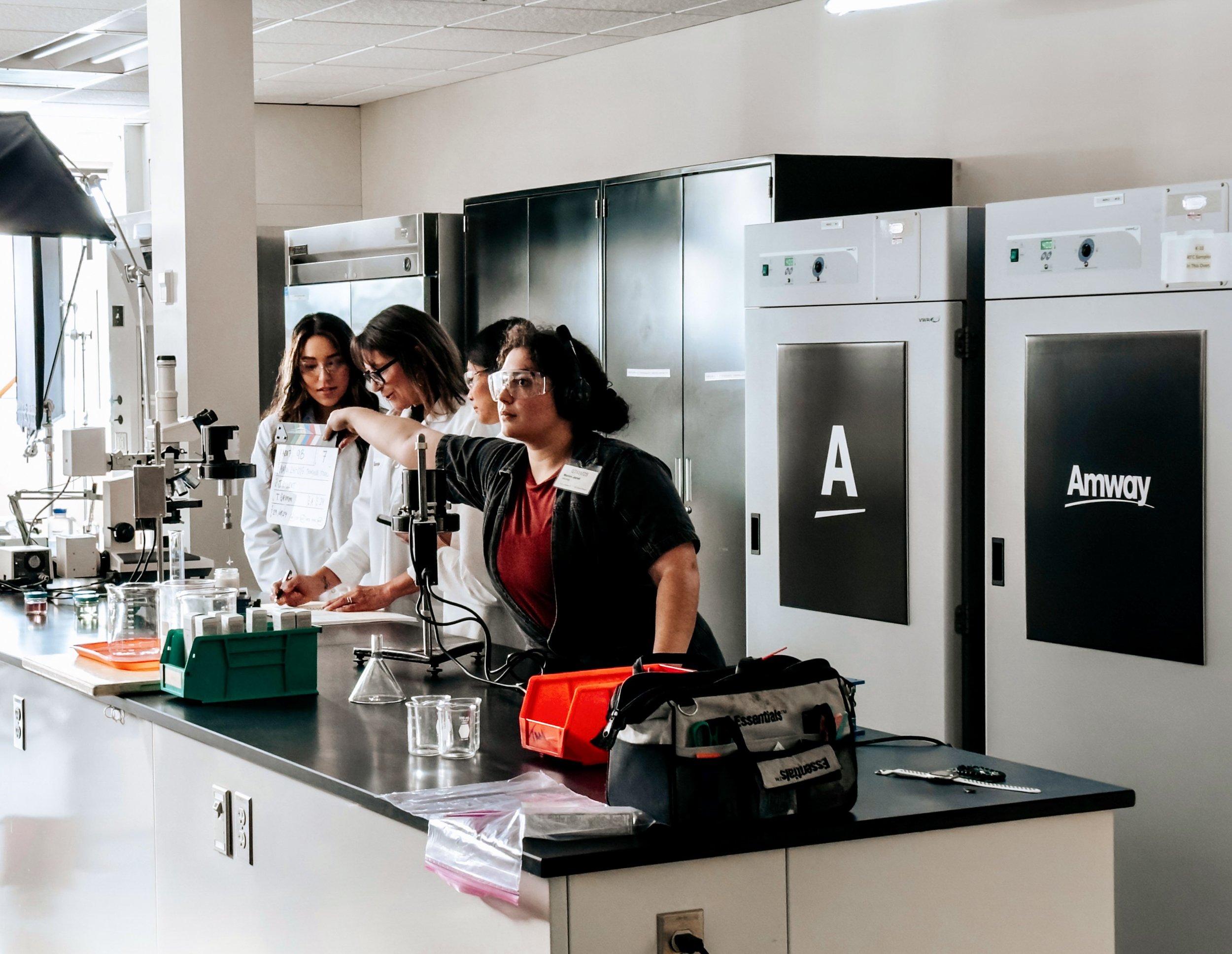 Behind-the-scenes photo from the Amway Traceability Tool shoot in a science lab setup.