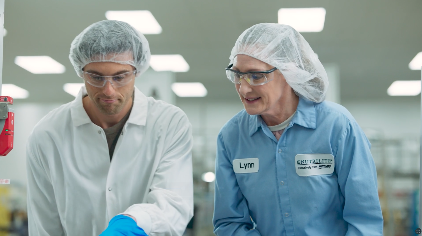 Amway team members working in a production lab.