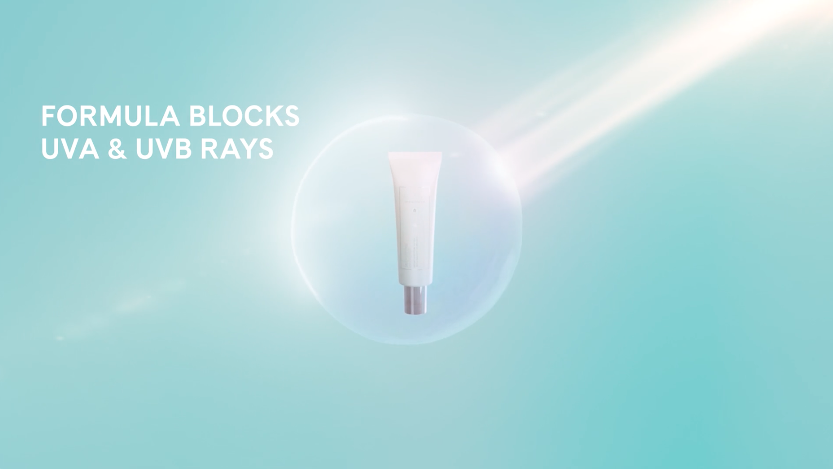 A white tube of Artistry UV50 sunscreen floating inside a protective glowing orb against a blue background.