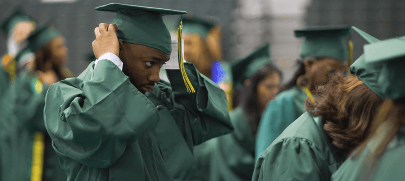 Rasmussen Florida graduates celebrating at commencement ceremony.