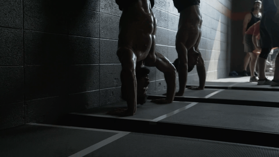 GIF from event recap highlight filmed by IDEOLOGY at 8th Day Gym during the CrossFit Games, capturing intense athlete moments