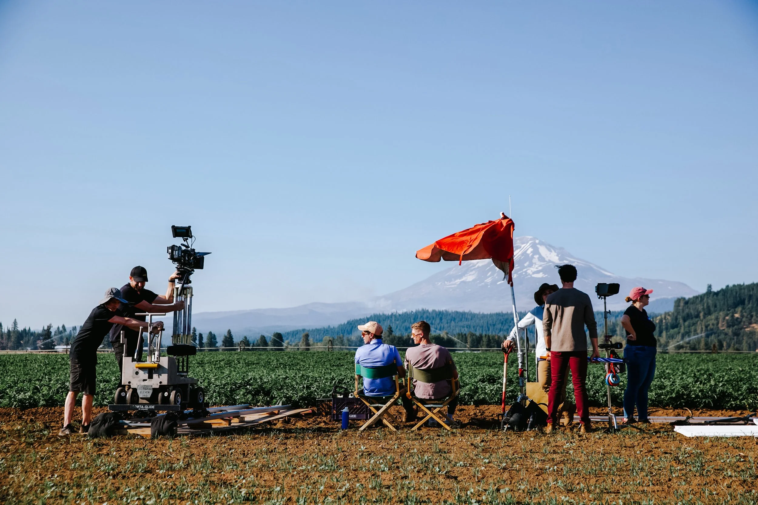 Behind-the-scenes photo from the Amway Traceability Tool shoot in a vegetable field.