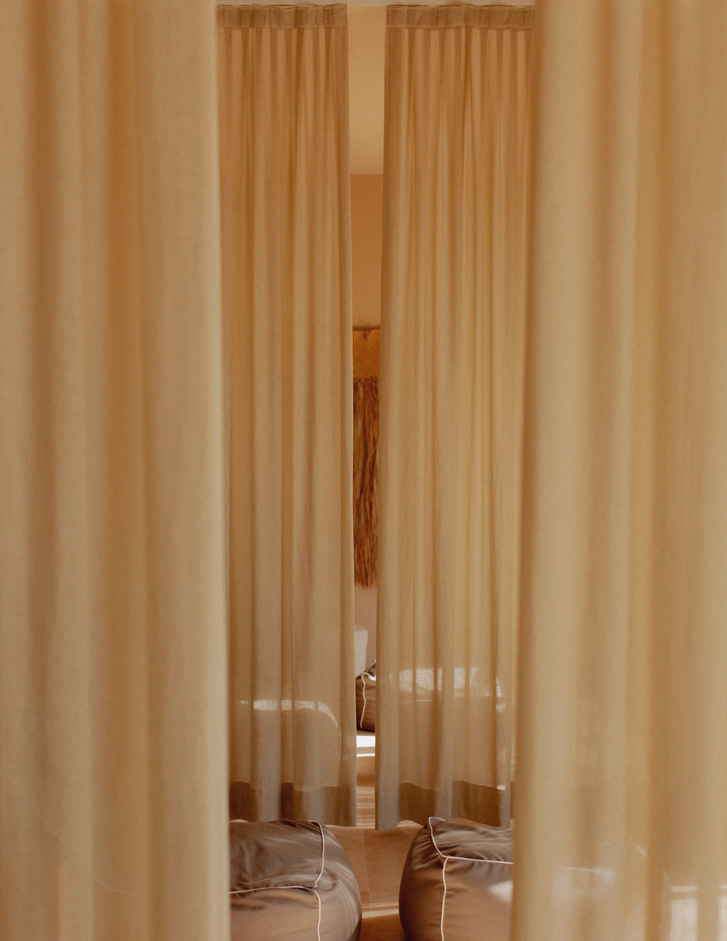 cream curtains in a hotel spa 