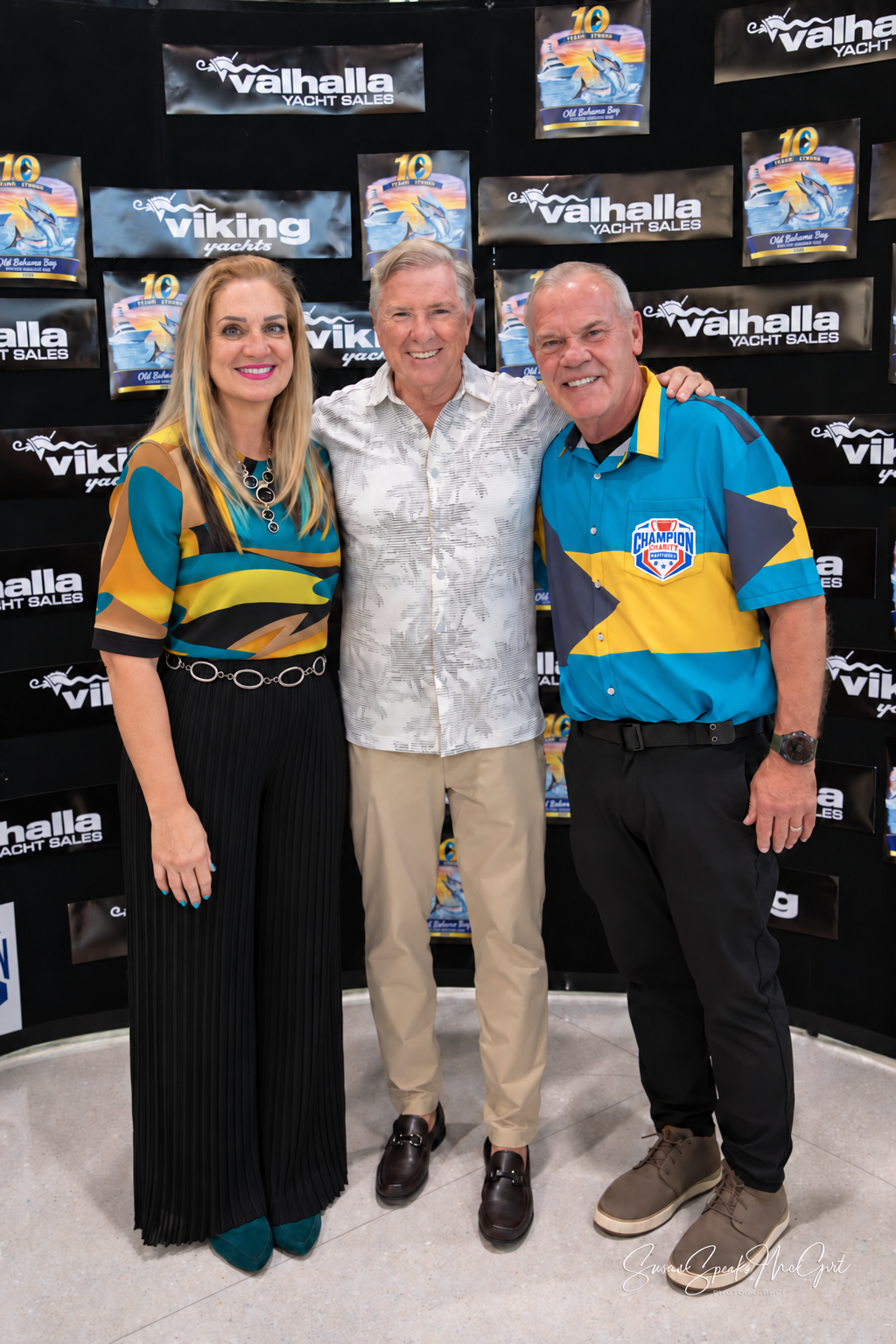 Three-person portrait with silver chain belt.png