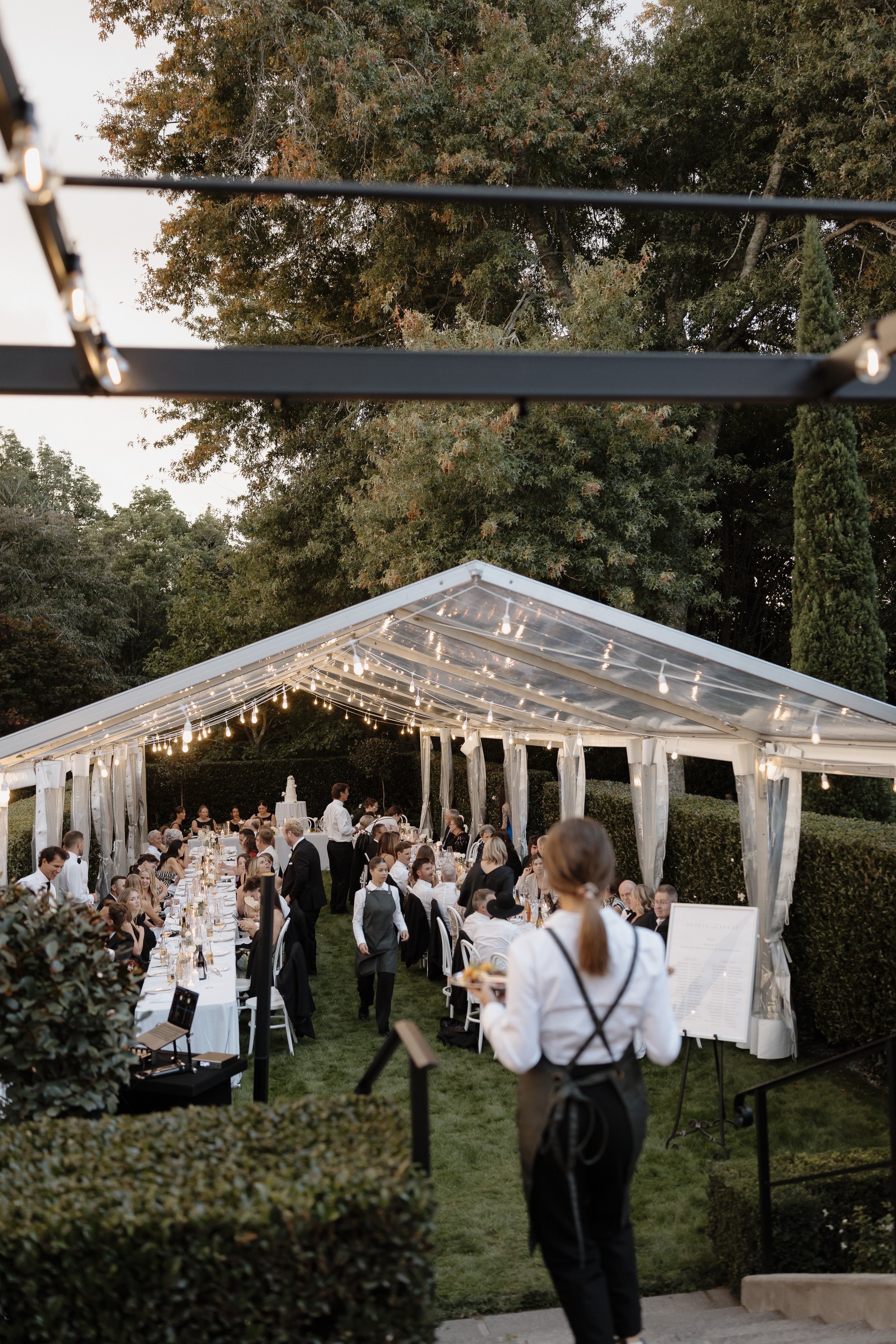 Styled wedding tablescape inside a Lucy's Events marquee