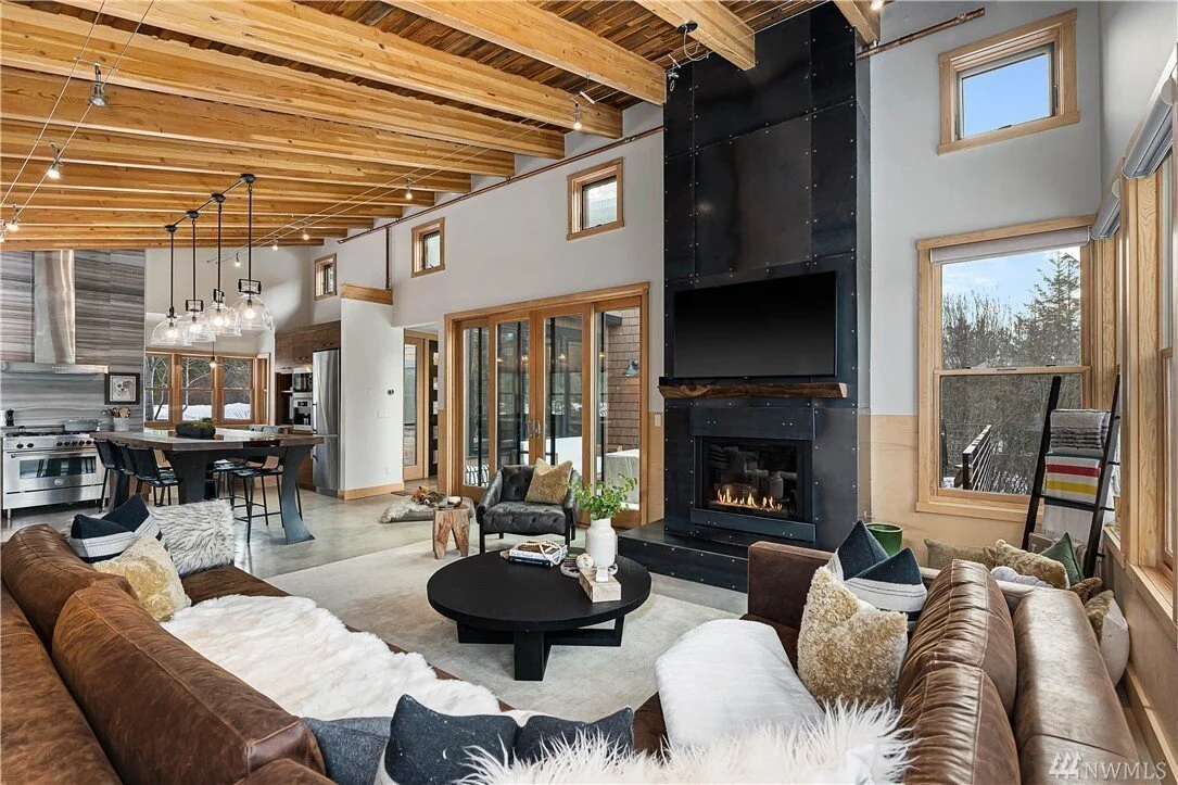 modern-living-room-view-fireplace-exposed-beams