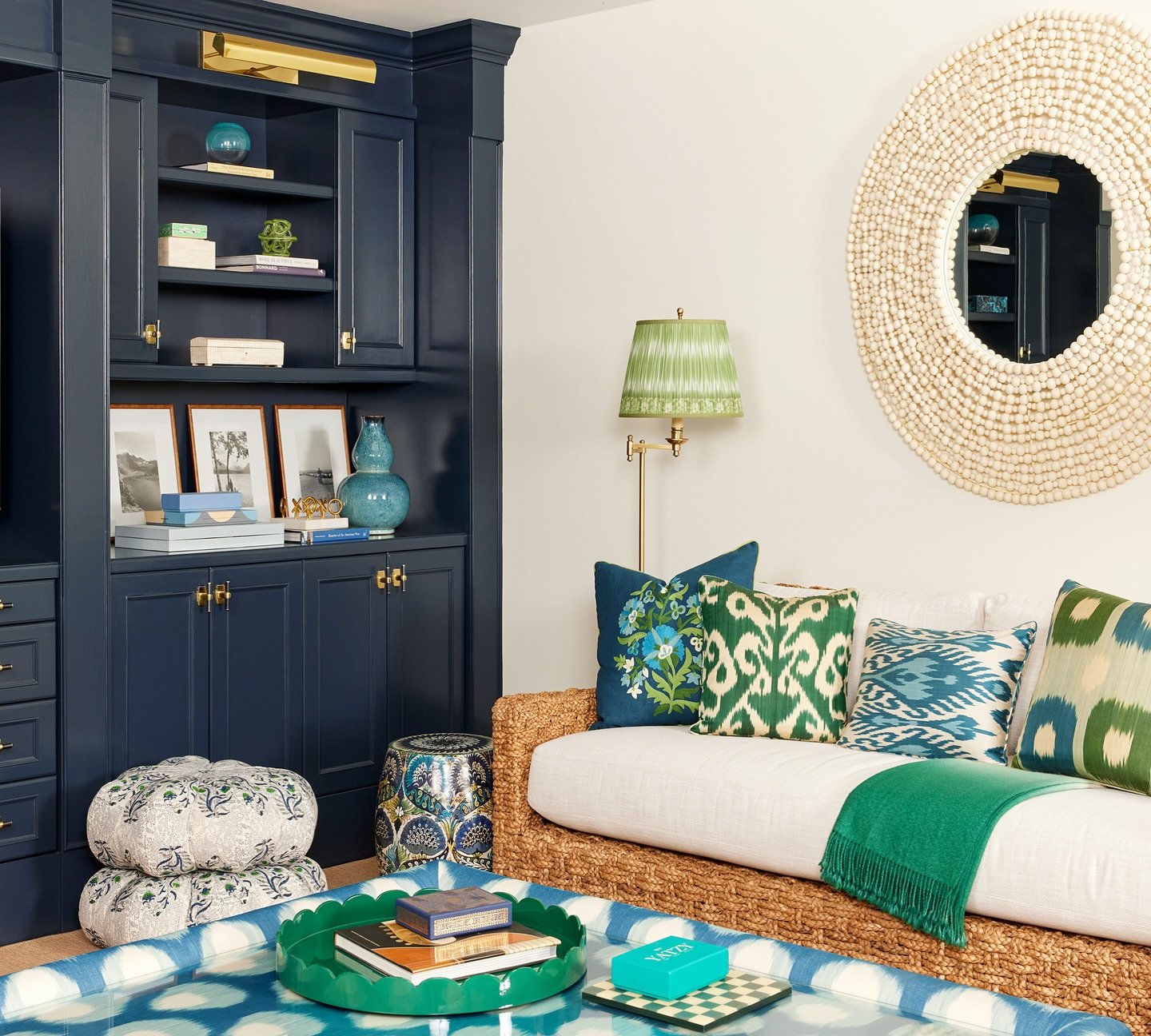Proof that you can never go wrong with ikat! This basement was so fun to decorate. Due to the lack windows we added some big statement mirrors and lots of ambient light. This mirror is a personal favorite of mine by @madegoods #libbysmithinteriors 
?