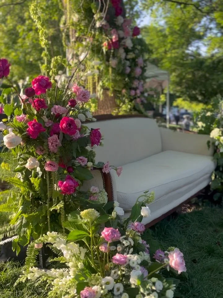 always in awe and so proud of the girls on the @heycamino.andco team that continue our floral installation tradition in the park for the @indianapeonyfestival. maggie (our incredible lead floral designer) and lanie (one of our amazing freelancers) br