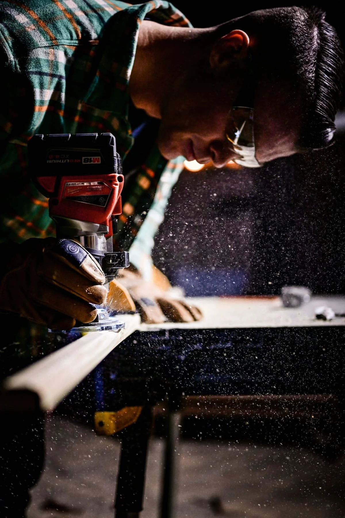 Man cutting wood in a workshop | campervan self build | Cornwall