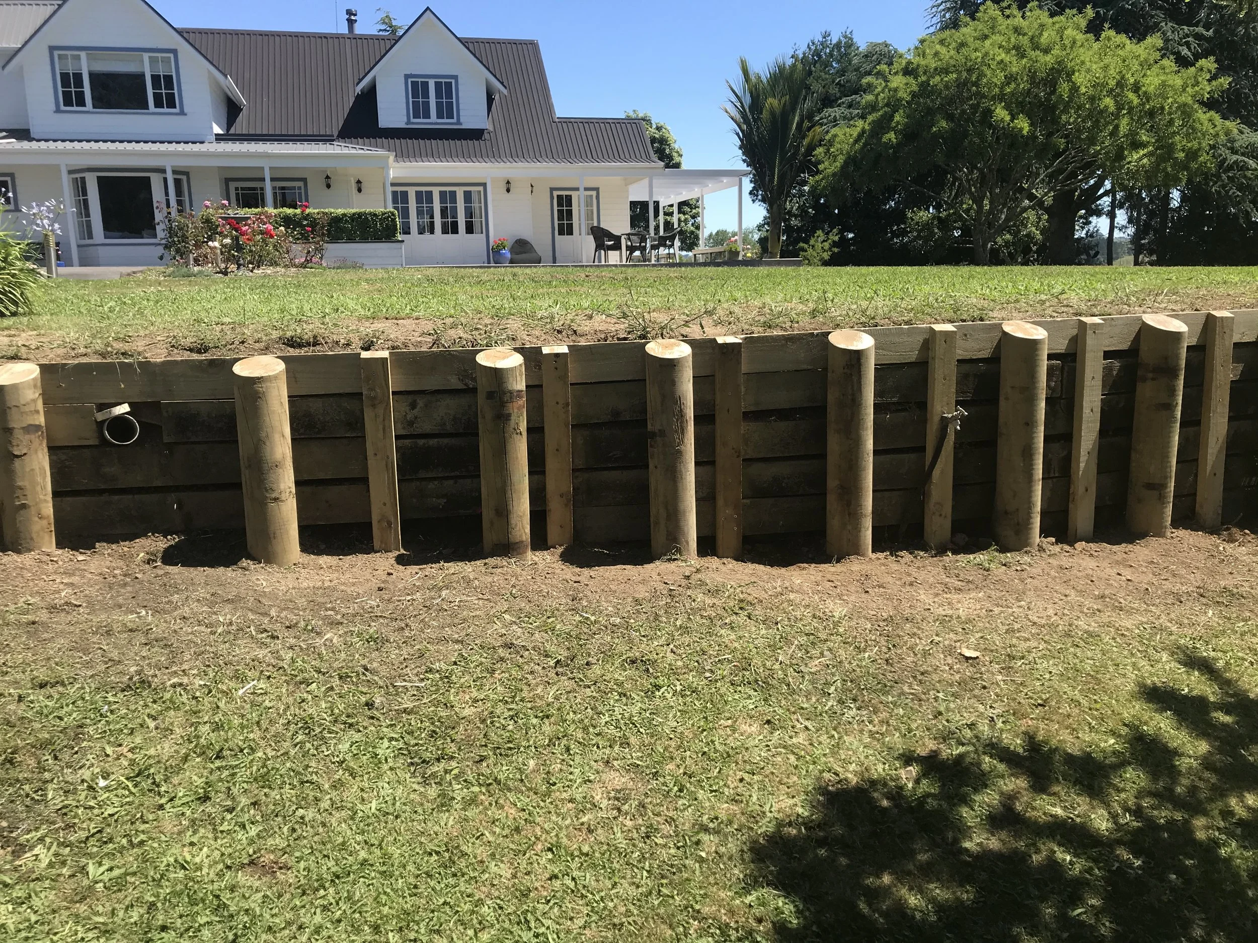 retaining wall at the front of a house