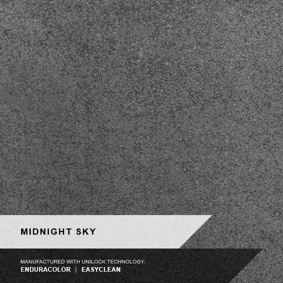 Close-up of a textured asphalt or concrete surface in gray color.