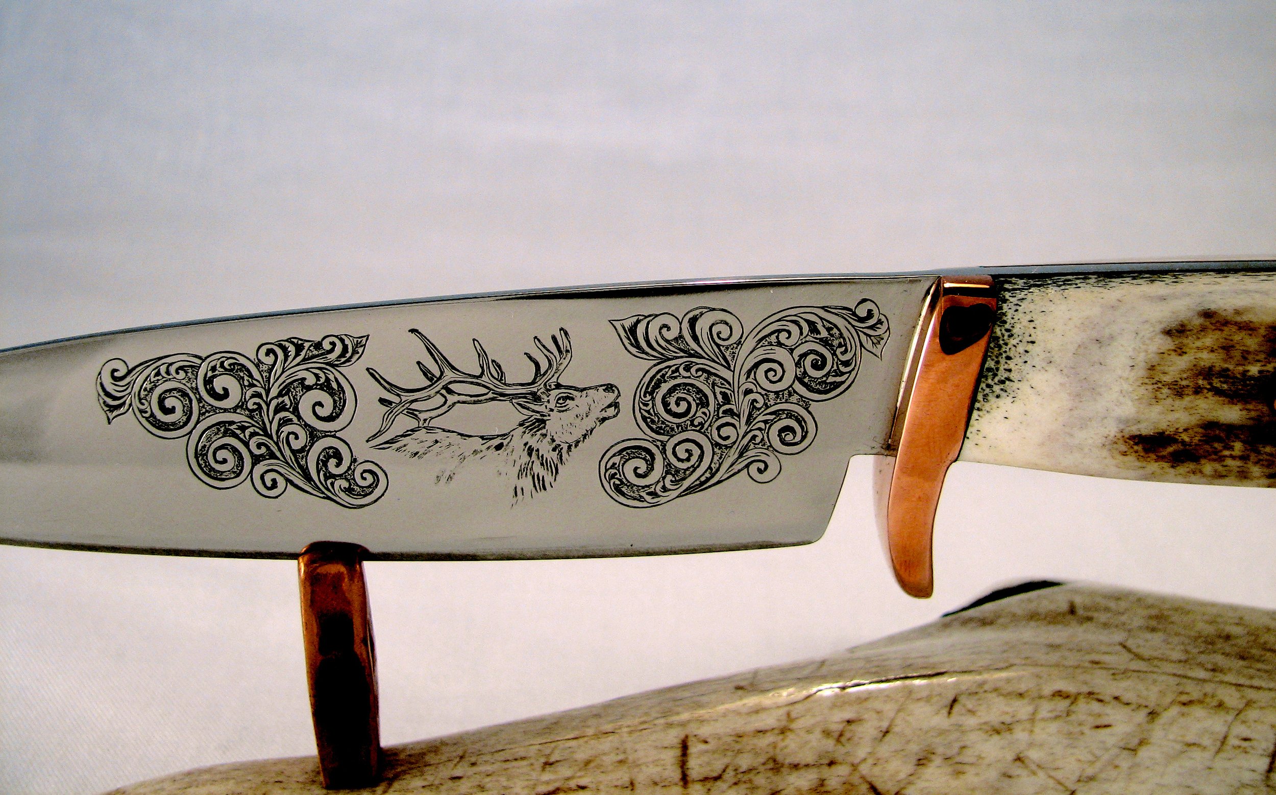 Engraved Elk with Scrolls Copper Hilt