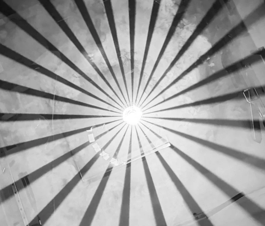 EK H1 moving head projecting a sharp radial beam gobo through haze, available for professional lighting hire on the Sunshine Coast, Brisbane and Sydney. Lasercone Gobo