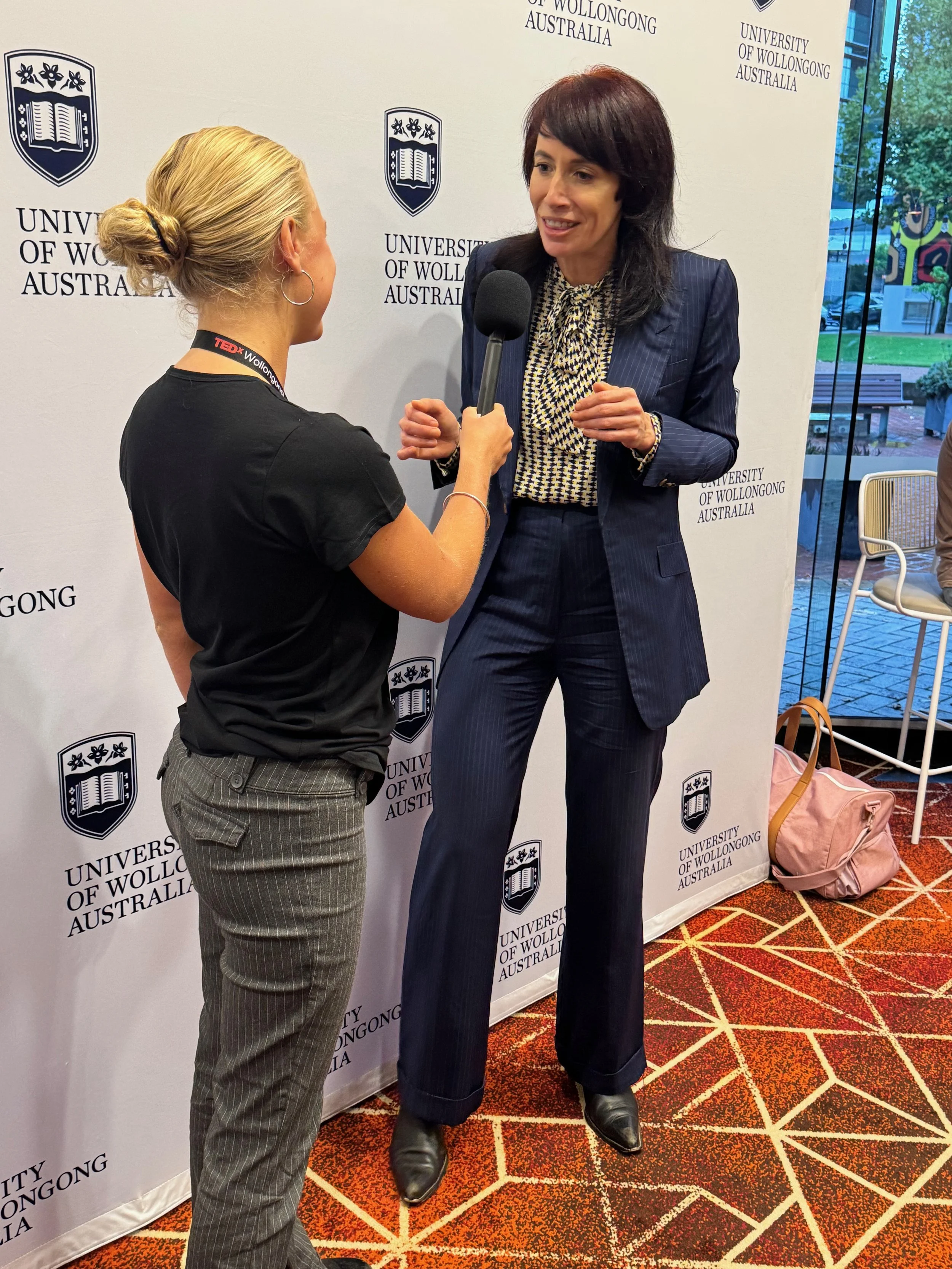 Dr Meghan Dares being interviewed at TEDxWollongong after speaking about healthspan, mobility and ageing well.