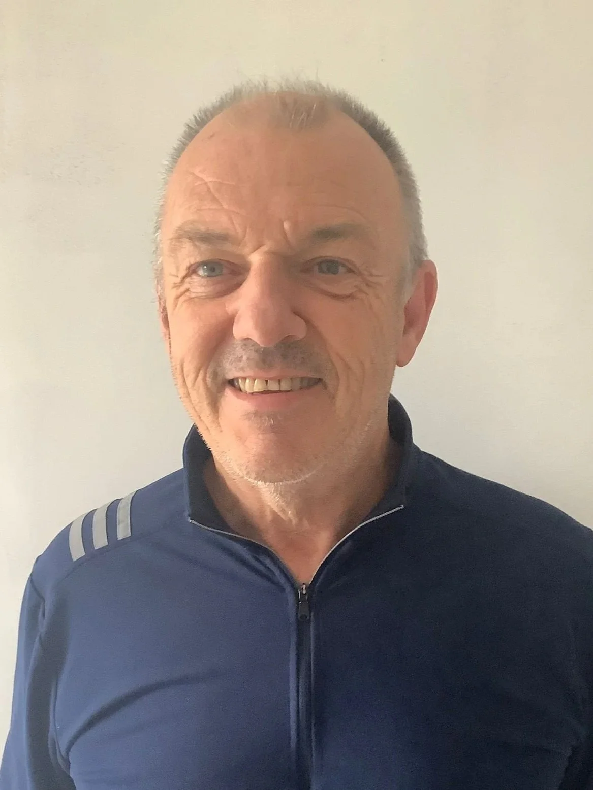 Placeholder circle with simple head and shoulders line drawing