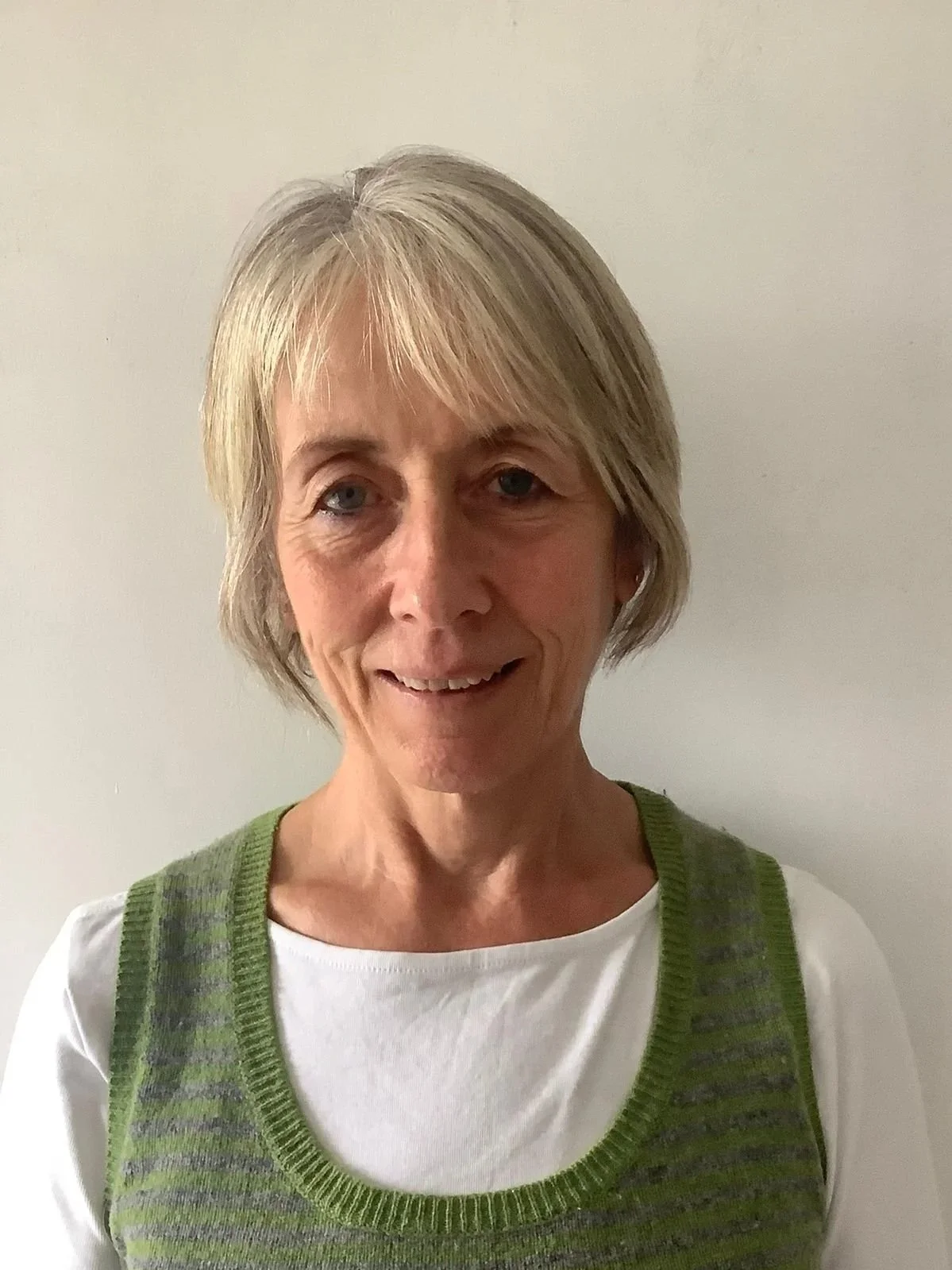 Placeholder image showing circle with simple head and shoulders line drawing