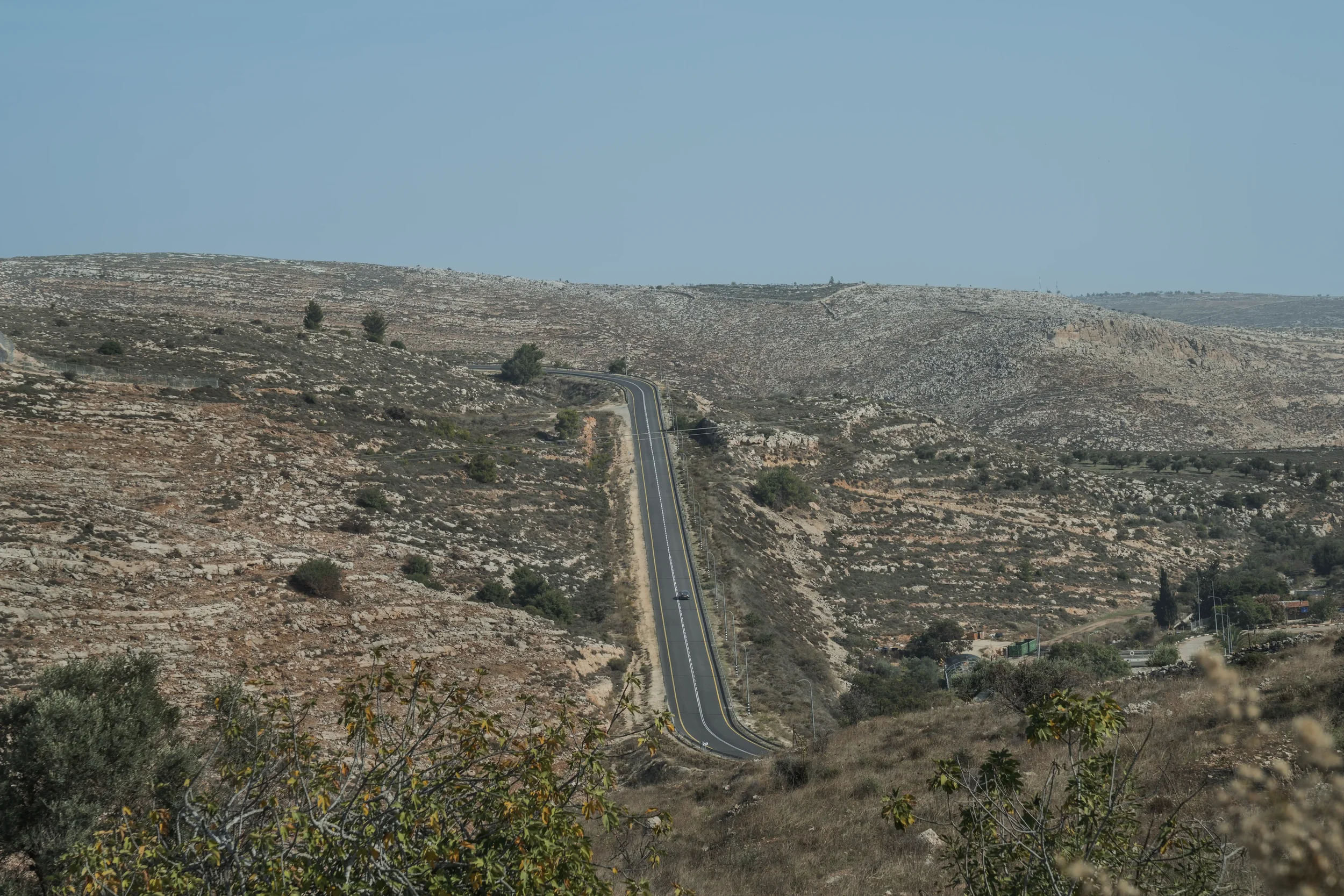 The hills around Ramallah are cut by a settler-only road, forcing Palestinians onto longer, fragmented routes that turn short distances into hours.
Ramallah - November 2025