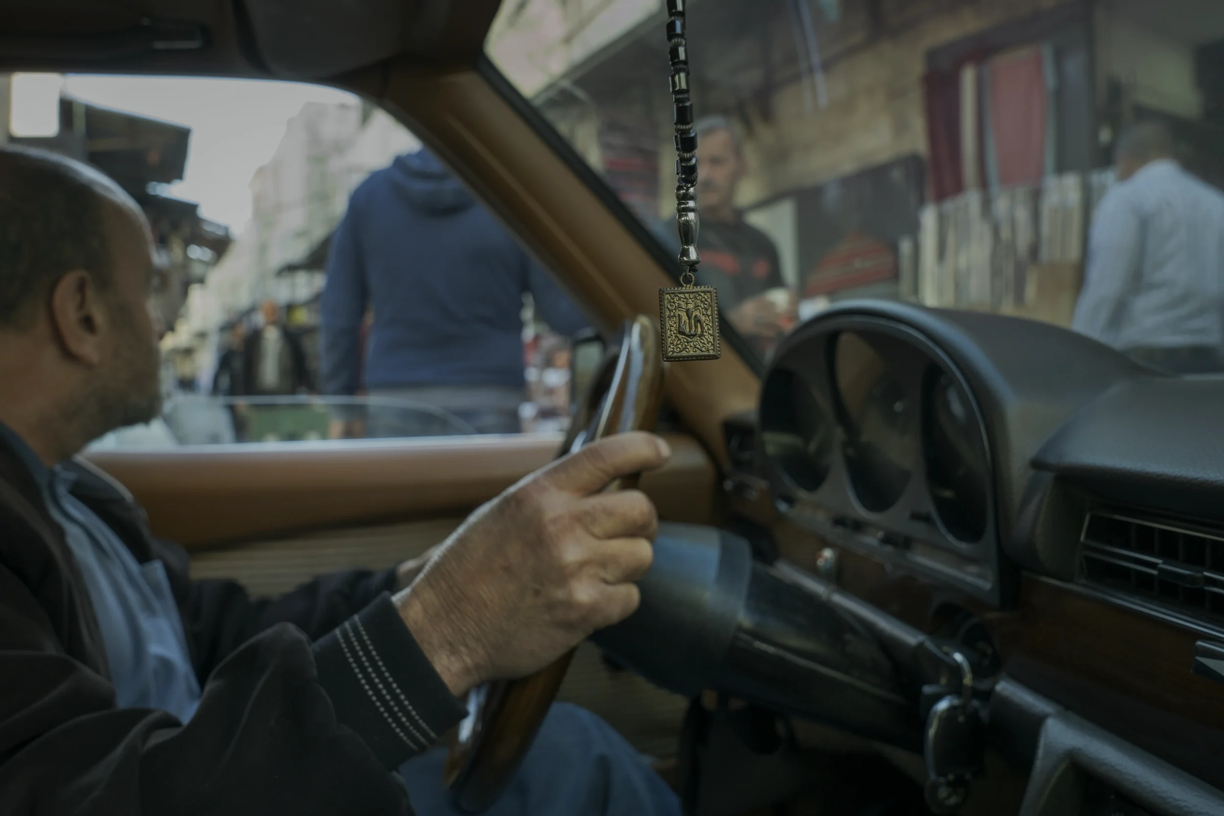 Hamza’s car in Nablus carries a sacred object hanging from the mirror — a blend of faith, road safety, and the constant awareness of sudden closures.
Nablus - December 2025