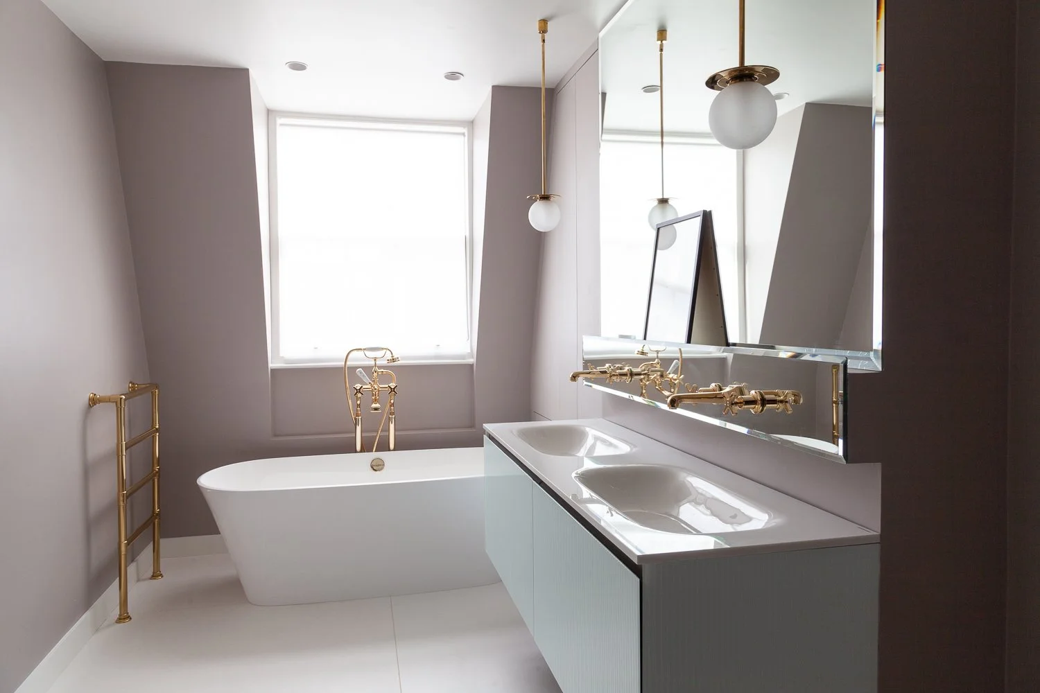 Bathroom with freestanding bath, gold fixtures and double vanity, interior photography, Mayfair
