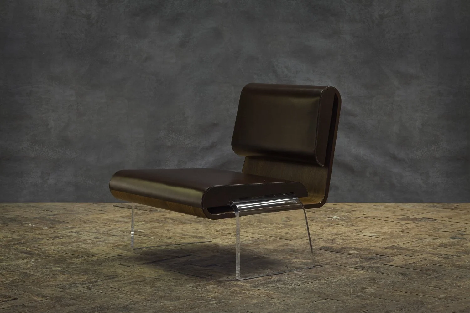 Romuald Stefanski Luroidea lounge chair in walnut-veneered ply with oak-bark-tanned leather, interior design photographer London