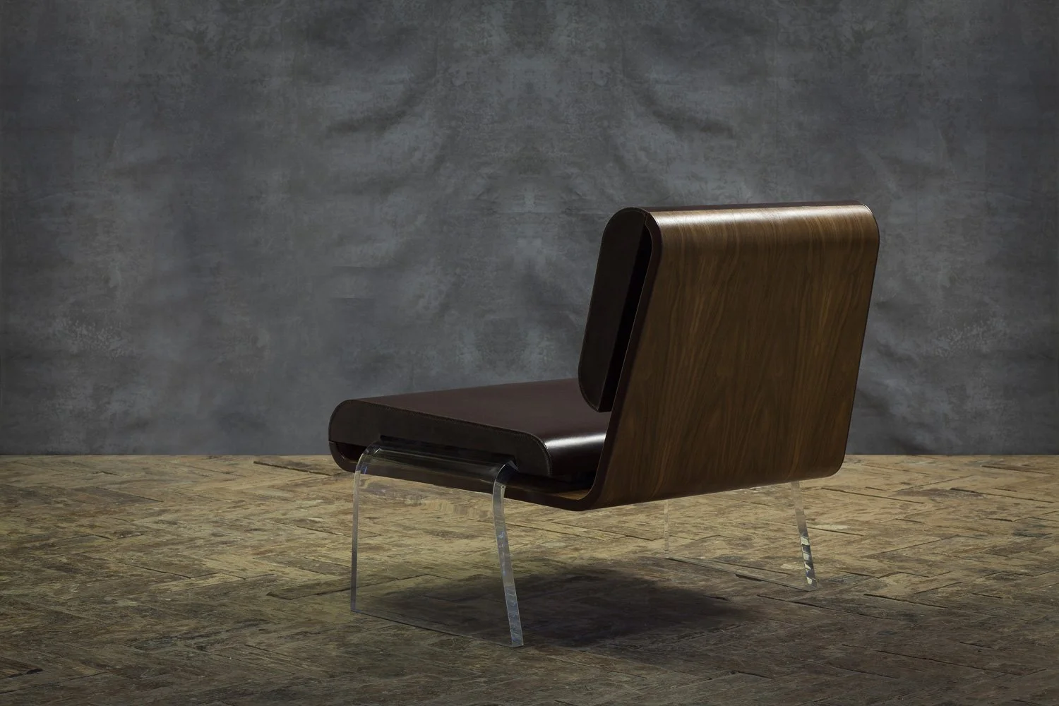 Rear view of the Romuald Stefanski Luroidea lounge chair, showing its Perspex base, interior photographer London
