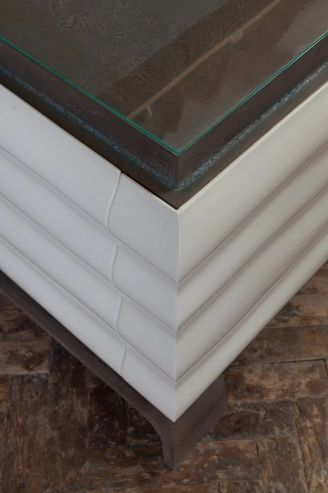 Detail of the Romuald Stefanski Ondina sideboard's corner and glass top, interior design photographer London