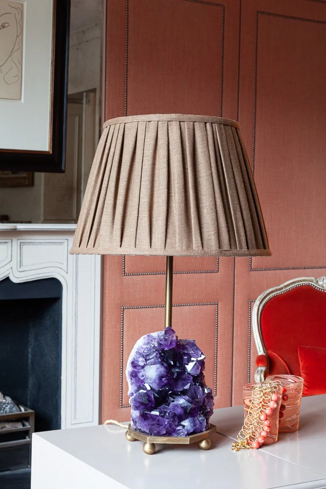 Isabelle Bizard amethyst crystal table lamp with Murano glass tumblers, interior photography