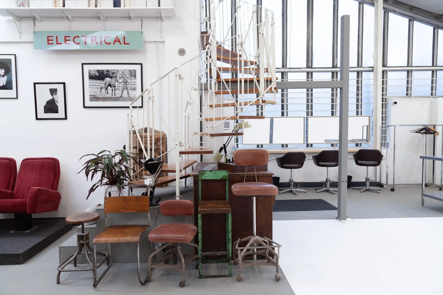 Wide view of photographic studio workspace with mezzanine level, interior design photography, Essex